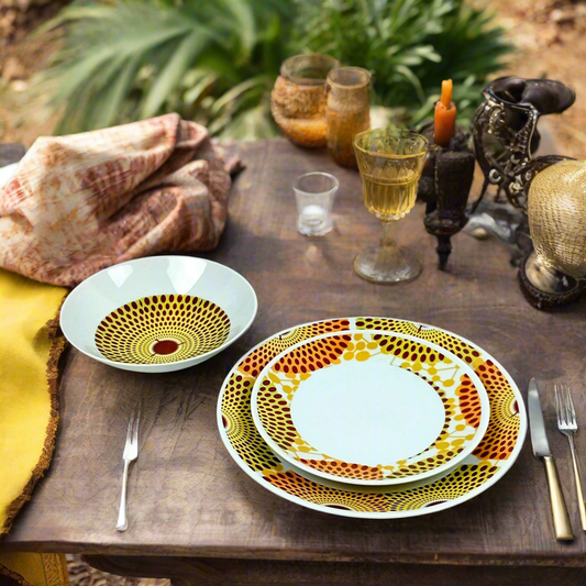 Coffret d'assiettes en porcelaine Française fabriquées à la demande avec motif anneaux larges wax d'Afrique Gammaphone orange dans coffret