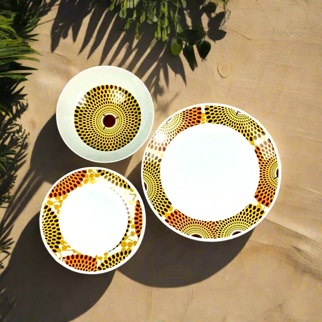 Coffret d'assiettes en porcelaine Française fabriquées à la demande avec motif anneaux larges wax d'Afrique Gammaphone orange dans coffret