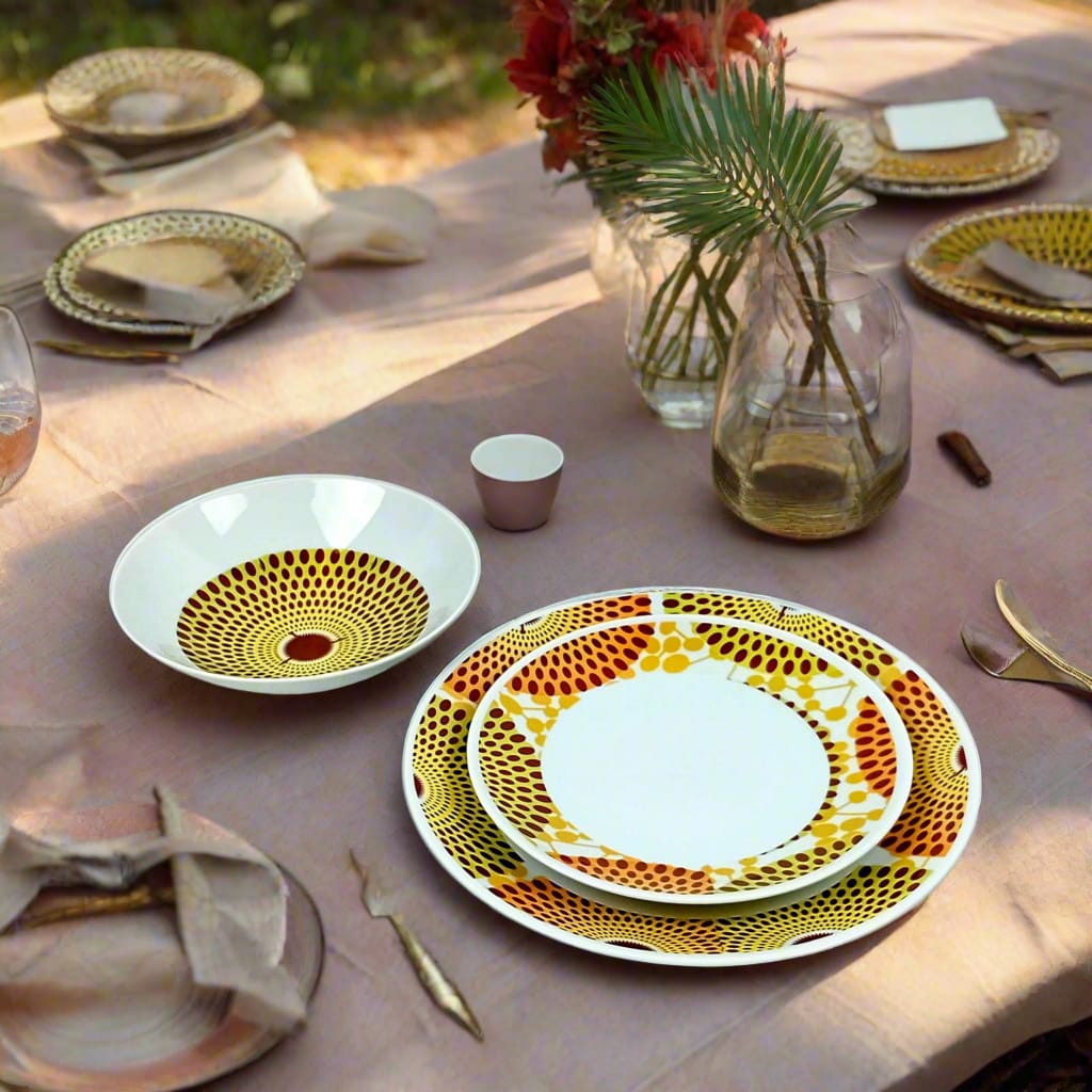 Coffret d'assiettes en porcelaine Française fabriquées à la demande avec motif anneaux larges wax d'Afrique Gammaphone orange dans coffret