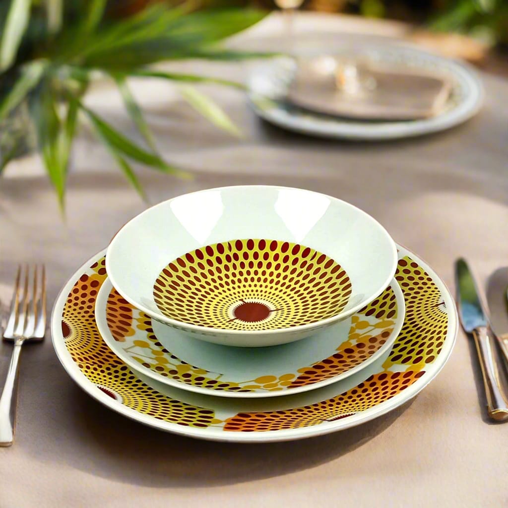 Coffret d'assiettes en porcelaine Française fabriquées à la demande avec motif anneaux larges wax d'Afrique Gammaphone orange dans coffret
