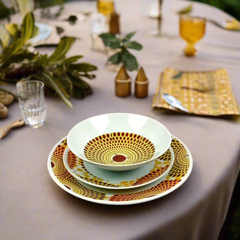 Coffret d'assiettes en porcelaine Française fabriquées à la demande avec motif anneaux larges wax d'Afrique Gammaphone orange dans coffret
