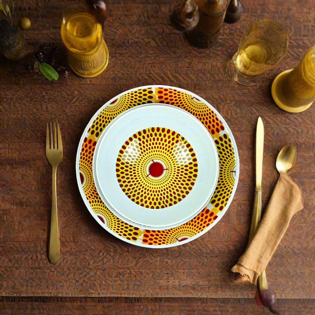 Coffret d'assiettes en porcelaine Française fabriquées à la demande avec motif anneaux larges wax d'Afrique Gammaphone orange dans coffret