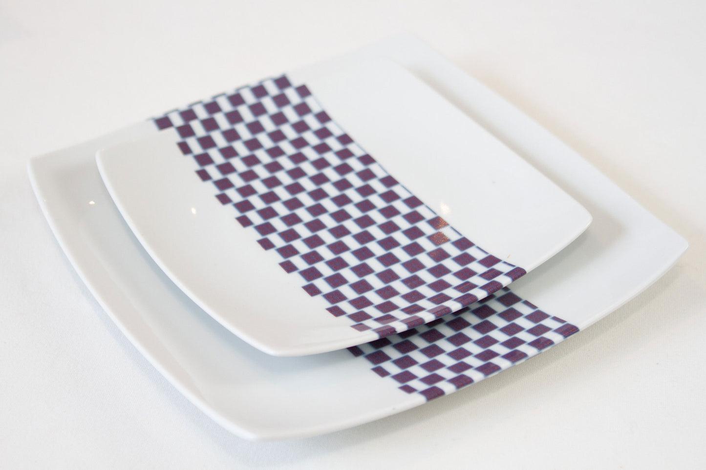 Set of square plates in fine French porcelain made to order with African WAX band motif "Ludo Kouin" in a set of 12