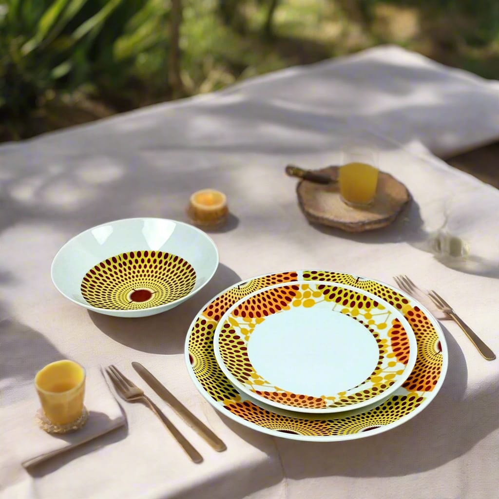 Coffret d'assiettes en porcelaine Française fabriquées à la demande avec motif anneaux larges wax d'Afrique Gammaphone orange dans coffret