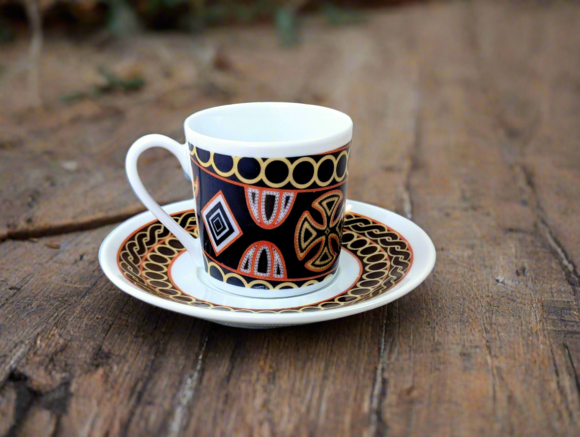 Fine French porcelain coffee cup made to order with saucer in the African ring motif "Ndop Bamoun" from Cameroon
