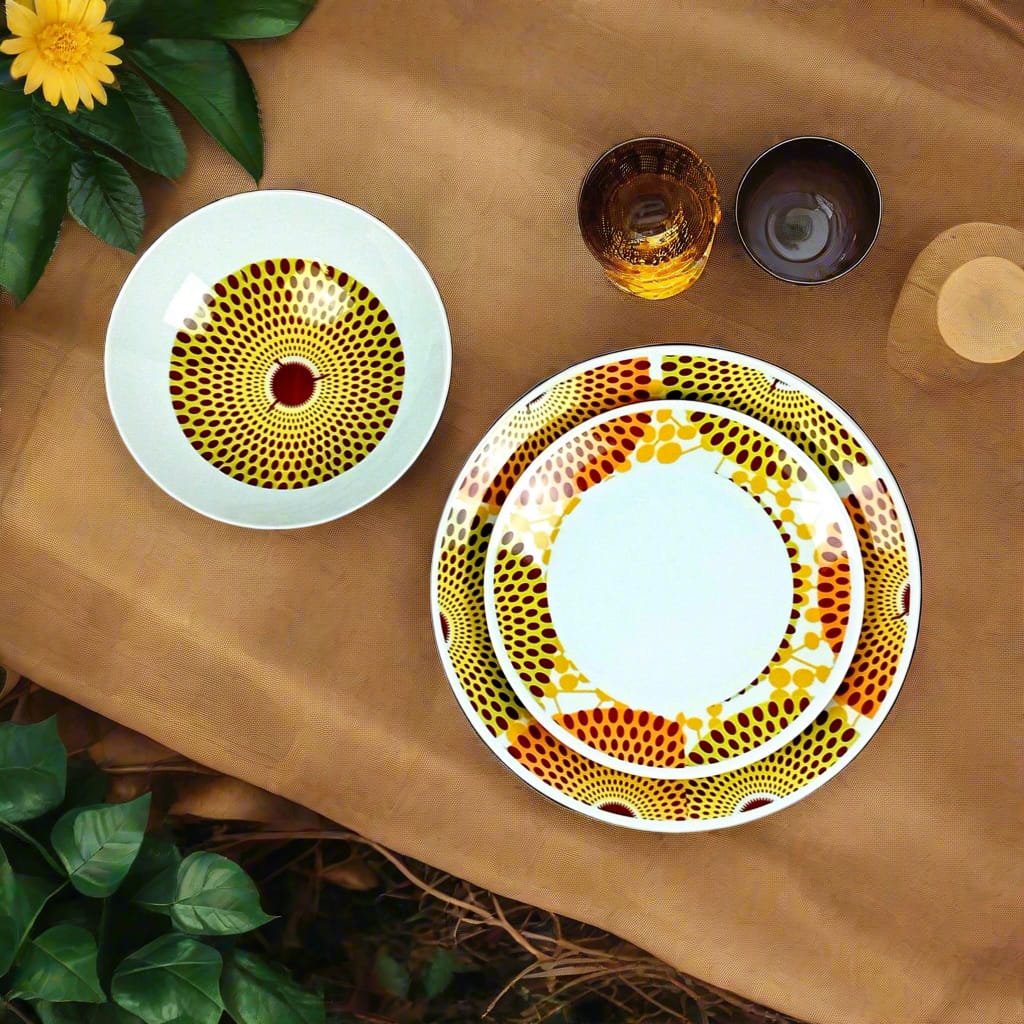 Coffret d'assiettes en porcelaine Française fabriquées à la demande avec motif anneaux larges wax d'Afrique Gammaphone orange dans coffret