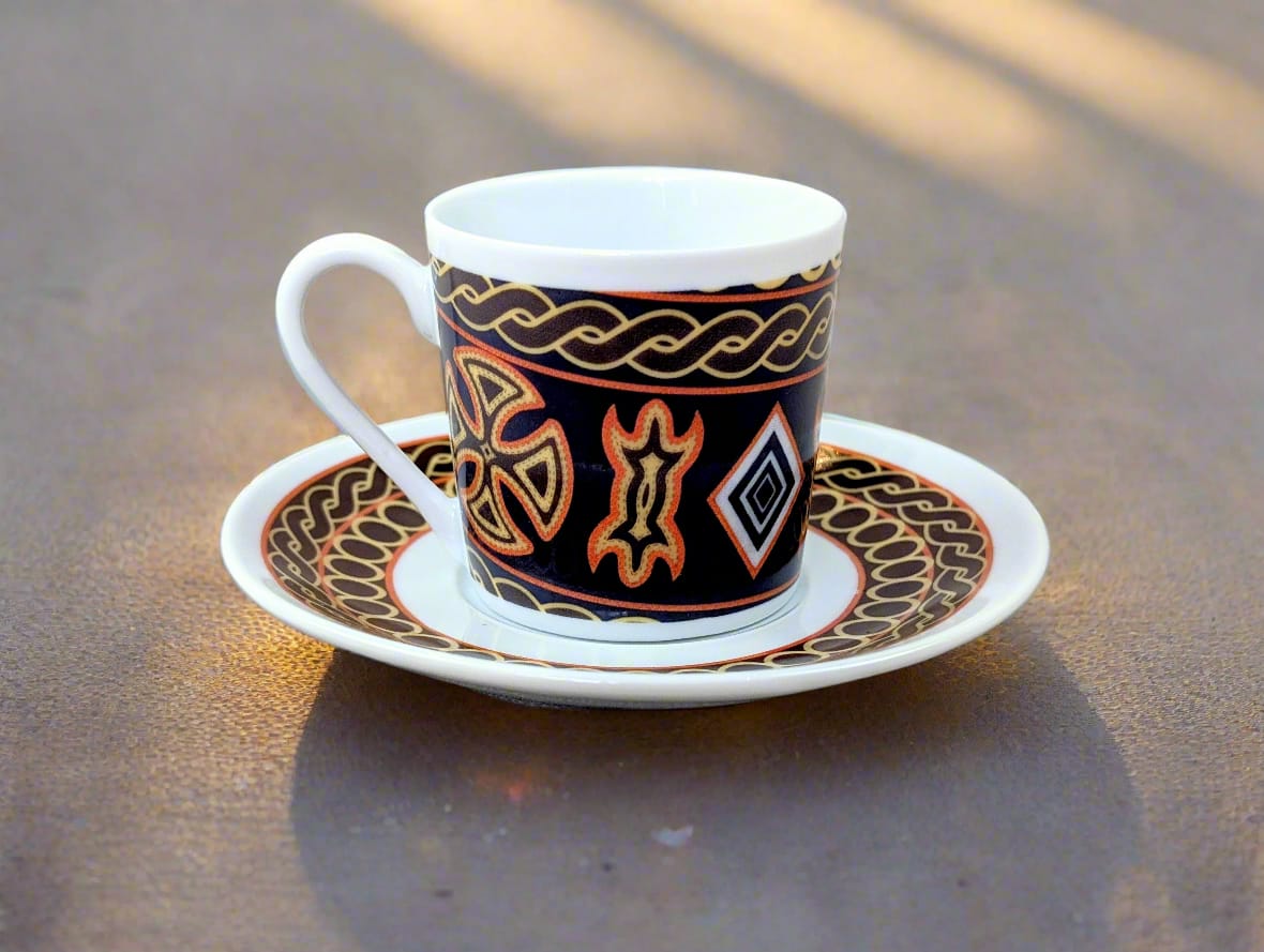 Fine French porcelain coffee cup made to order with saucer in the African ring motif "Ndop Bamoun" from Cameroon