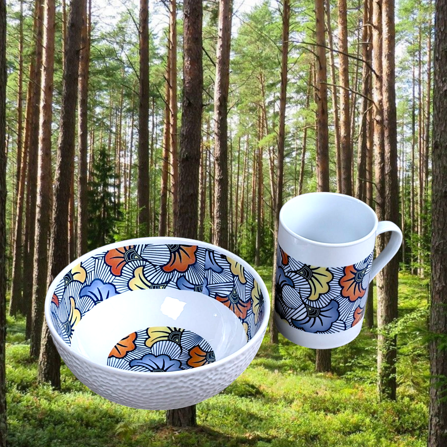 Coffret petit déjeuner en porcelaine fine française, orné d’un motif WAX "Fleurs de Mariage", composé d'une assiette creuse, d'une tasse à  café et d'un MUG, présentés dans une boîte prestige.