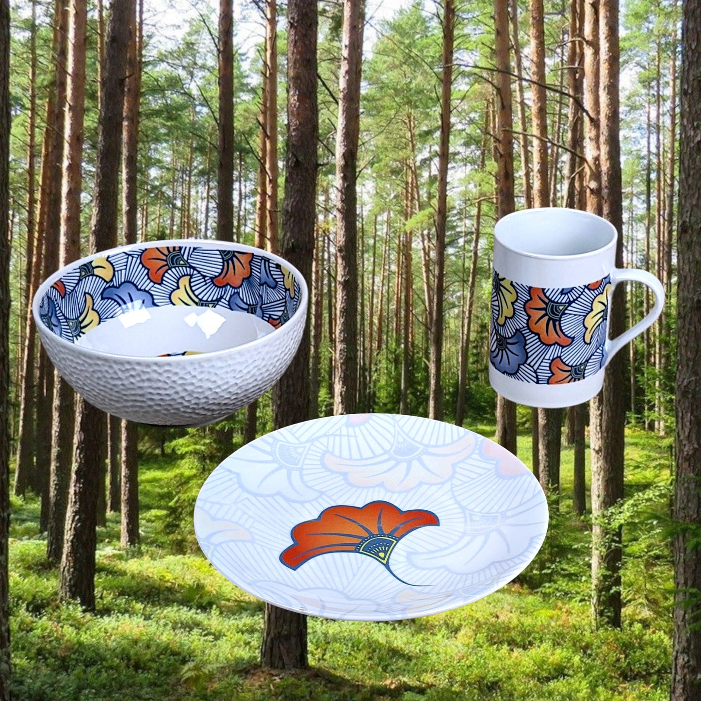 Coffret petit déjeuner en porcelaine fine française, orné d’un motif WAX "Fleurs de Mariage", composé d'une assiette creuse, d'une tasse à  café et d'un MUG, présentés dans une boîte prestige.