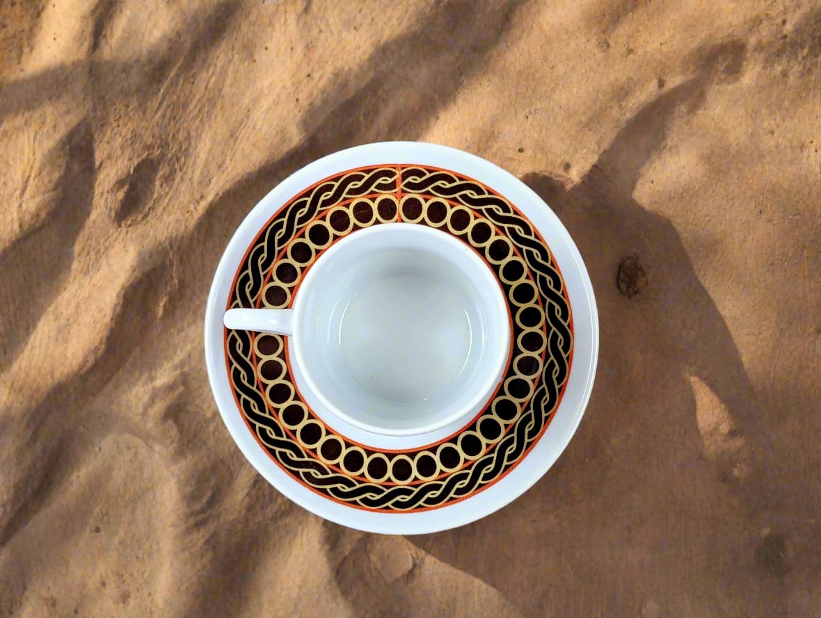Fine French porcelain coffee cup made to order with saucer in the African ring motif "Ndop Bamoun" from Cameroon