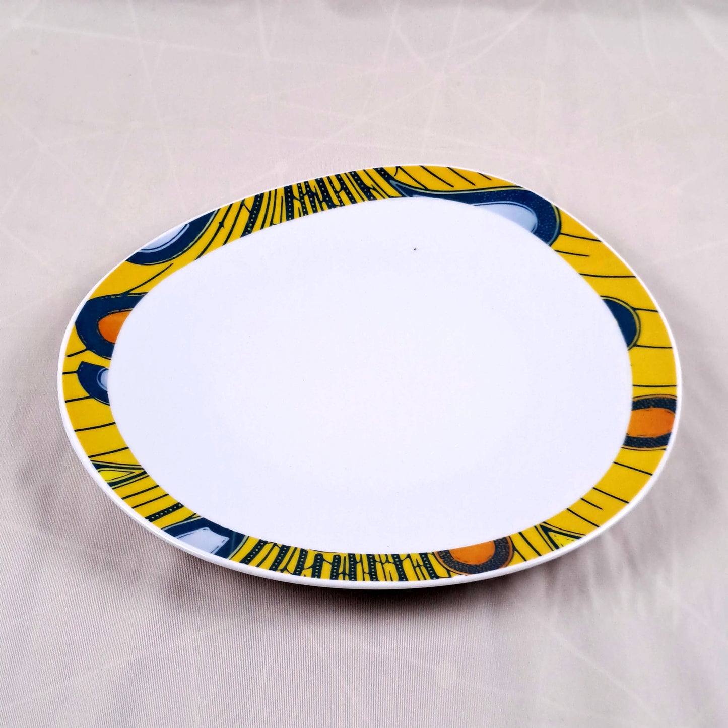 Coffret de 6 Assiettes Ovales en Porcelaine Fine – Motif Wax Africain “Electric Bulb” – Fabrication française personnalisable