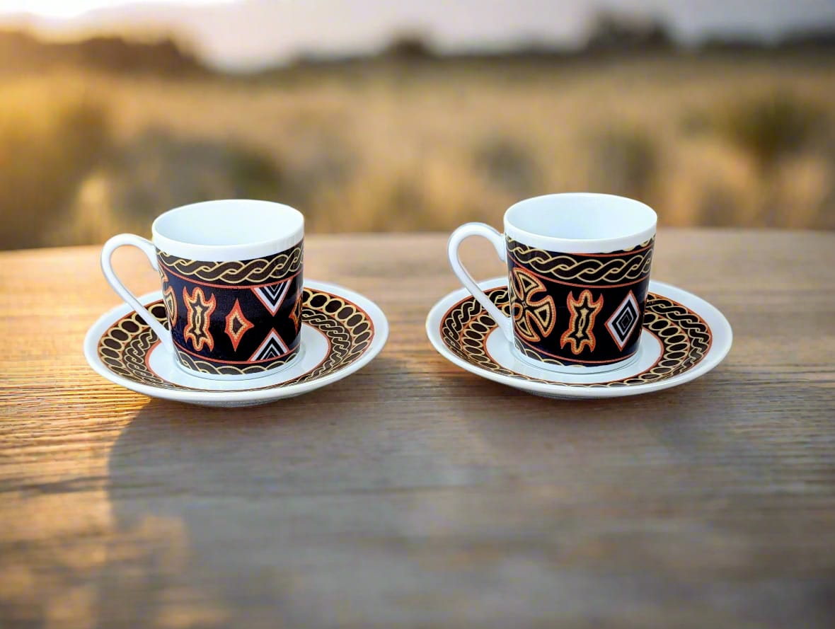 Fine French porcelain coffee cup made to order with saucer in the African ring motif "Ndop Bamoun" from Cameroon