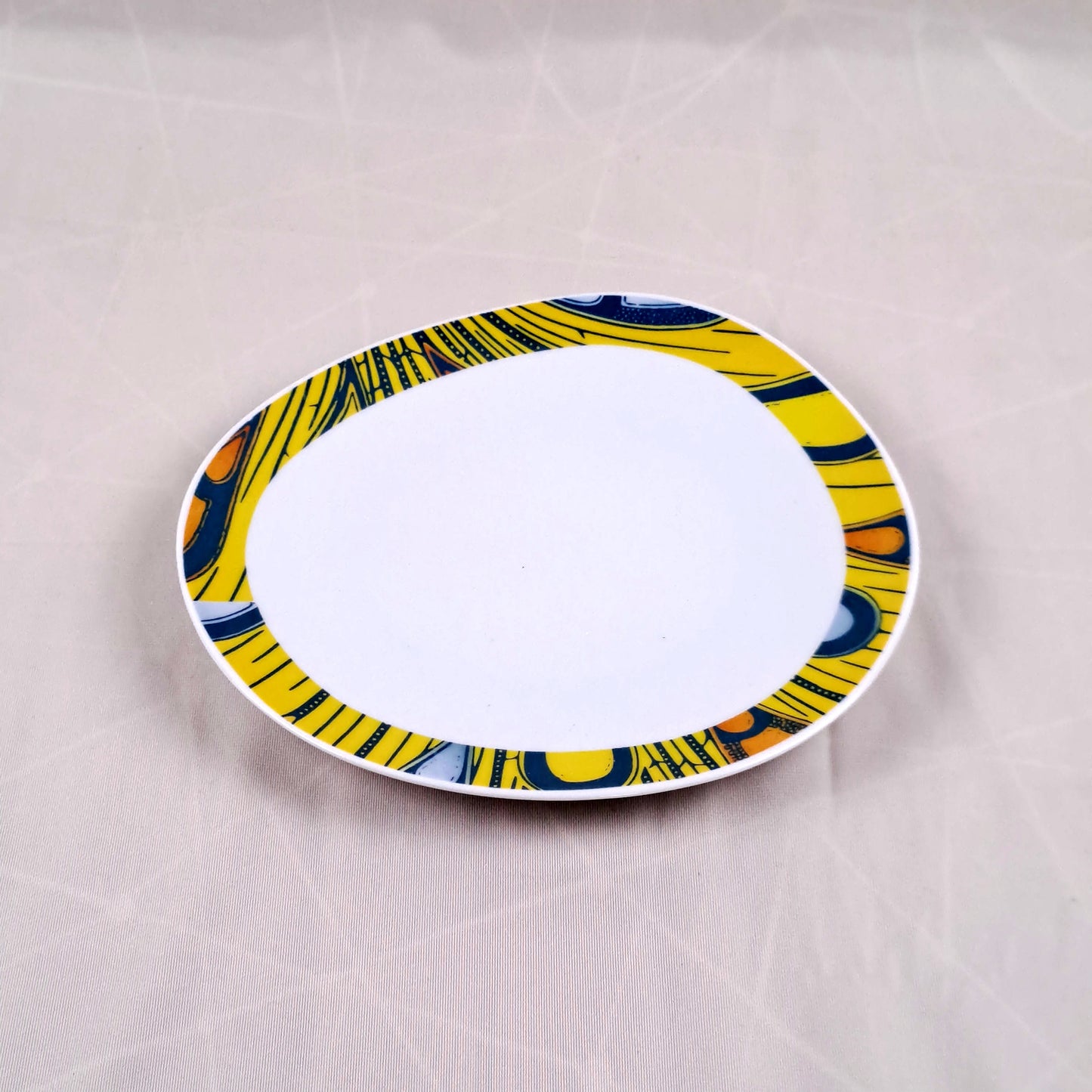 Coffret de 6 Assiettes Ovales en Porcelaine Fine – Motif Wax Africain “Electric Bulb” – Fabrication française personnalisable